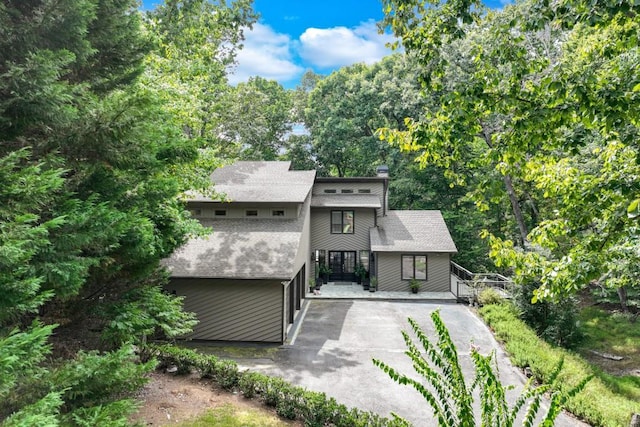 6144 Scott Dr, Flowery Branch, GA 30542 - view of front of home with roof with shingles and concrete driveway