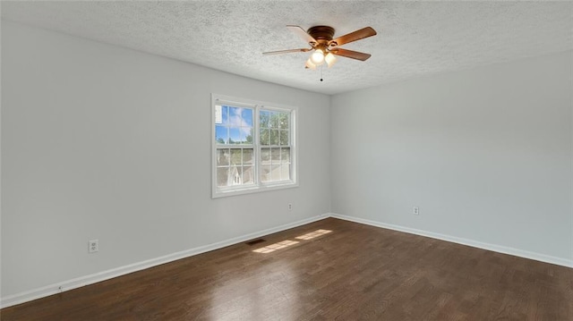 6964 Oakhill Cir, Austell, GA 30168 - empty room featuring dark wood-type flooring, ceiling fan, baseboards, and a textured ceiling