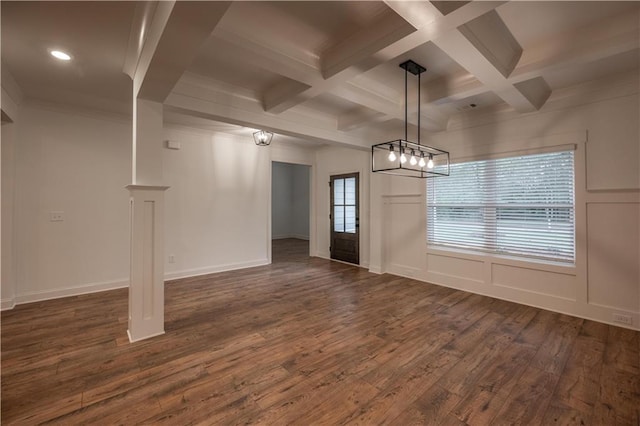 unfurnished dining area with beam ceiling, dark hardwood / wood-style flooring, crown molding, and coffered ceiling