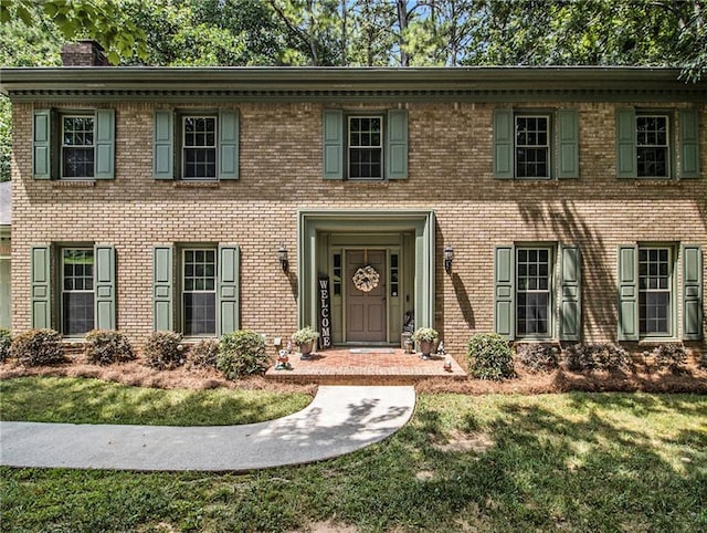 colonial house with a front lawn