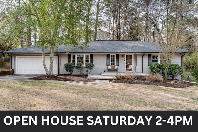 single story home with brick siding, a porch, a front yard, and a garage