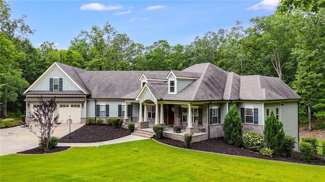 7269 Tyree Rd, Winston, GA 30187 - view of front of property with a porch, driveway, a front lawn, and view of wooded area