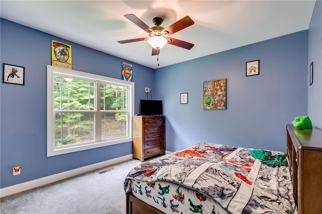 7269 Tyree Rd, Winston, GA 30187 - carpeted bedroom with baseboards and a ceiling fan