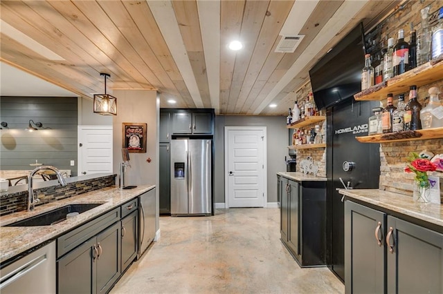 7269 Tyree Rd, Winston, GA 30187 - kitchen with appliances with stainless steel finishes, open shelves, light stone counters, recessed lighting, and concrete floors