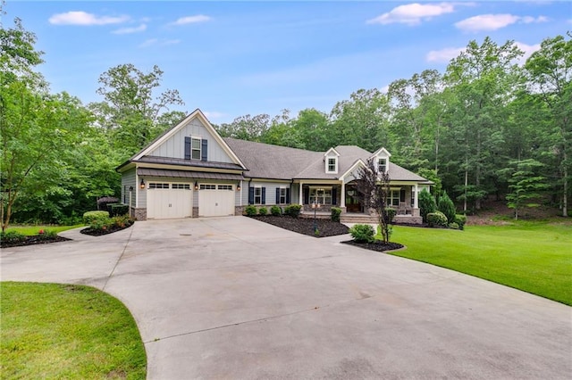 7269 Tyree Rd, Winston, GA 30187 - craftsman-style house with concrete driveway, board and batten siding, a porch, a front lawn, and an attached garage