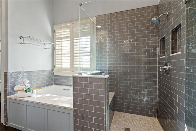 full bathroom featuring a shower stall and vanity