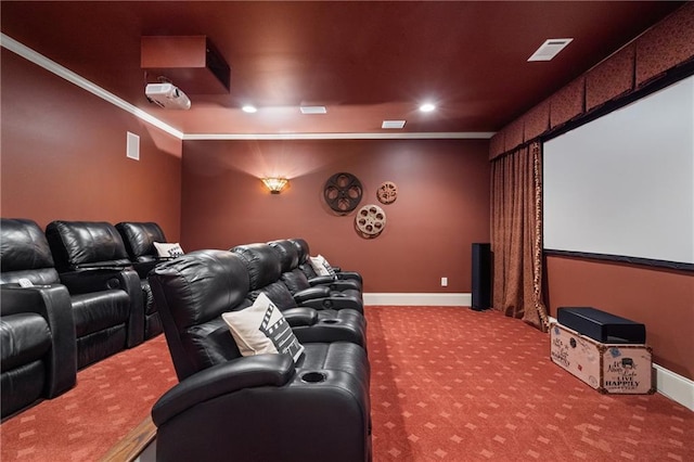 carpeted cinema featuring crown molding, recessed lighting, visible vents, and baseboards