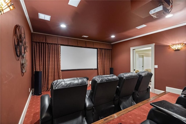 carpeted home theater room with ornamental molding, recessed lighting, visible vents, and baseboards