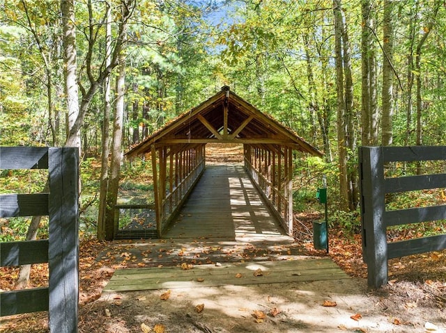 view of property's community with a view of trees