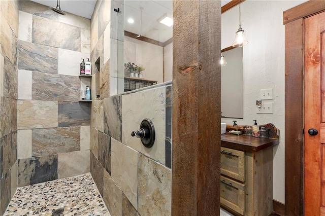 bathroom with toilet, crown molding, and vanity