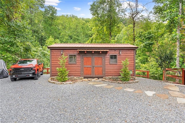 view of log cabin