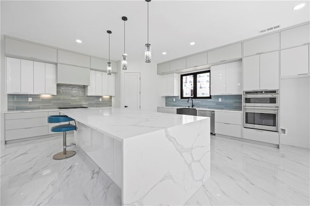4238 Hamilton Mill Rd, Buford, GA 30519 - kitchen featuring modern cabinets, appliances with stainless steel finishes, backsplash, and recessed lighting