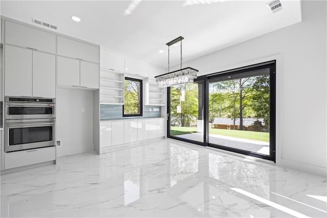 4238 Hamilton Mill Rd, Buford, GA 30519 - unfurnished dining area featuring light marble finish floors, recessed lighting, and a chandelier