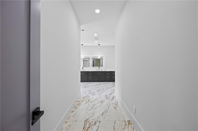 4238 Hamilton Mill Rd, Buford, GA 30519 - hallway featuring light marble finish flooring, baseboards, and recessed lighting