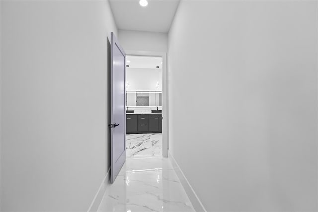 4238 Hamilton Mill Rd, Buford, GA 30519 - hallway featuring light marble finish floors, baseboards, and recessed lighting