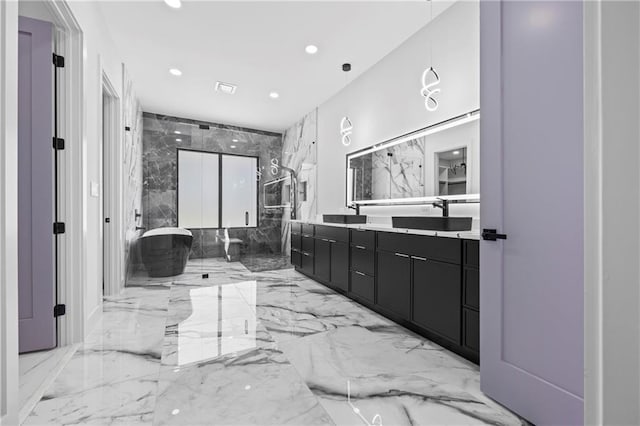 4238 Hamilton Mill Rd, Buford, GA 30519 - bathroom with marble tiled floors, a freestanding tub, double vanity, recessed lighting, and a shower