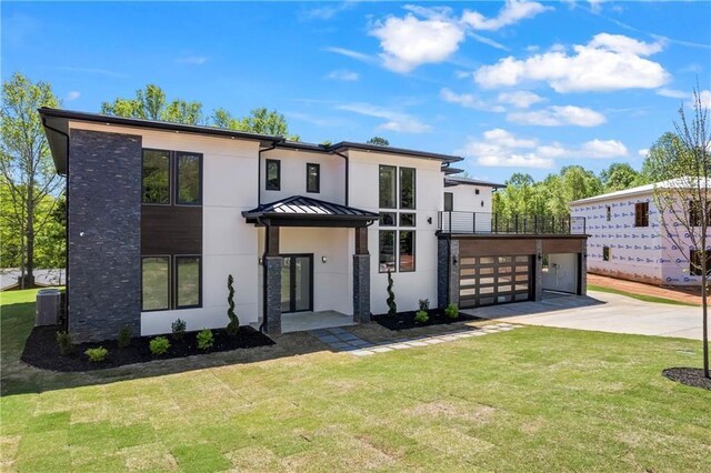 4238 Hamilton Mill Rd, Buford, GA 30519 - modern home with stucco siding, driveway, cooling unit, and a front lawn