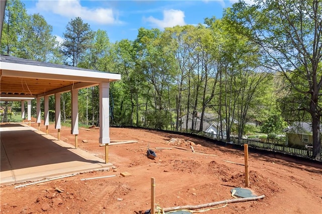 4238 Hamilton Mill Rd, Buford, GA 30519 - view of yard featuring fence and view of wooded area