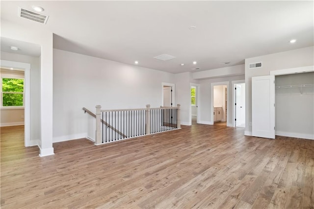4002 Adler Cir, Buford, GA 30519 - interior space with baseboards, wood finished floors, and visible vents