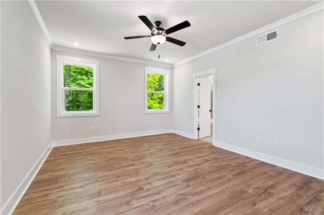 4002 Adler Cir, Buford, GA 30519 - unfurnished room featuring baseboards, wood finished floors, visible vents, and ornamental molding