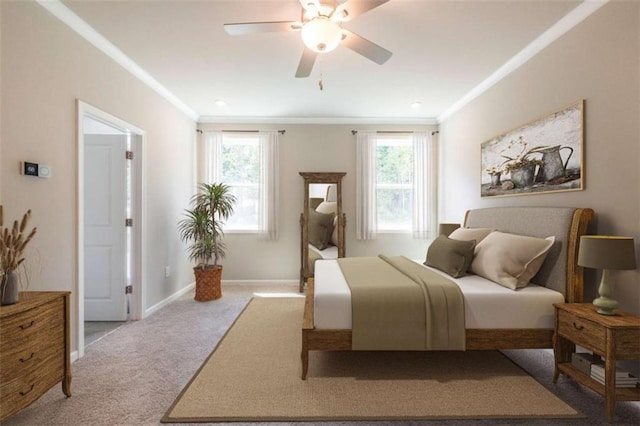 carpeted bedroom featuring ceiling fan and crown molding