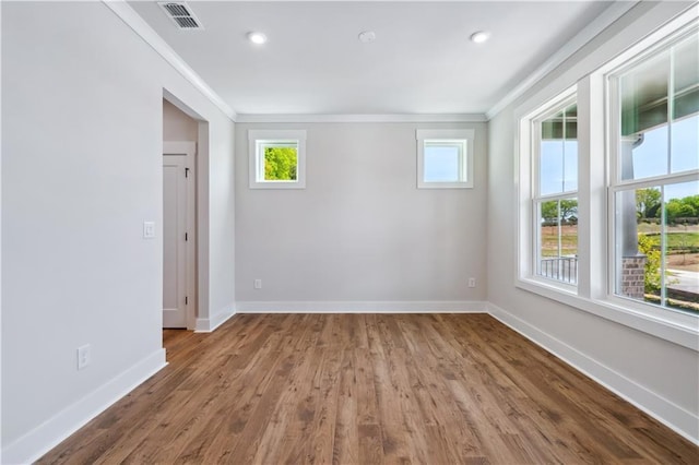 4002 Adler Cir, Buford, GA 30519 - spare room featuring baseboards, visible vents, and crown molding