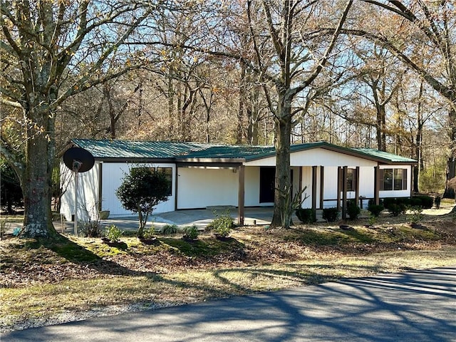 view of front of house with metal roof