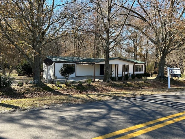 view of front facade with metal roof