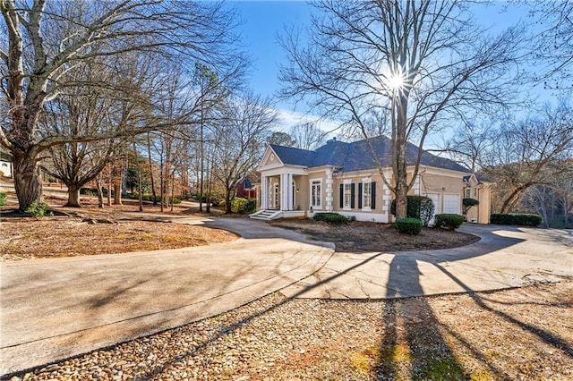 view of front of property with a garage