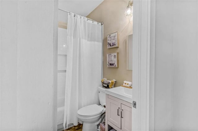 full bathroom featuring vanity, toilet, and shower / tub combo with curtain