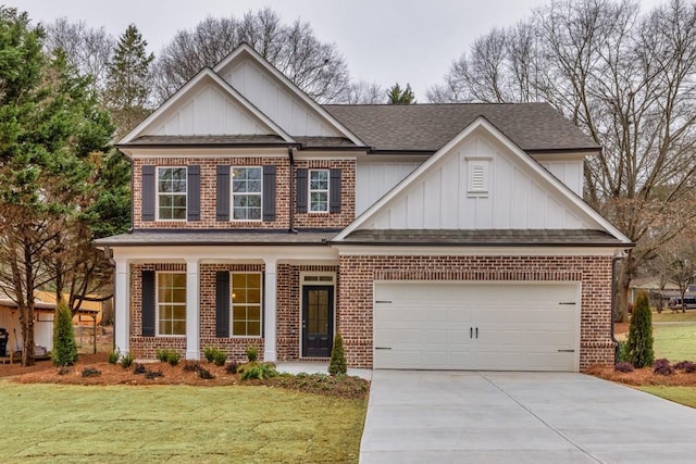 craftsman-style home with a front yard and a garage