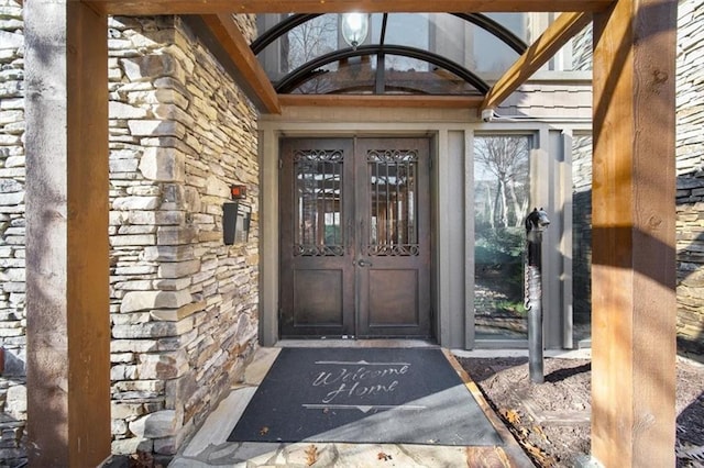 doorway to property featuring french doors