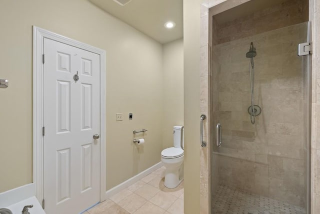 bathroom with toilet, tile patterned floors, and an enclosed shower