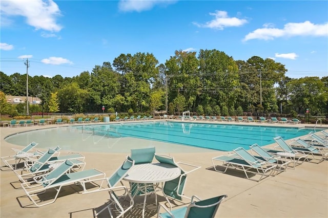 view of swimming pool featuring a patio