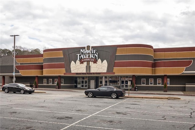 view of property with uncovered parking