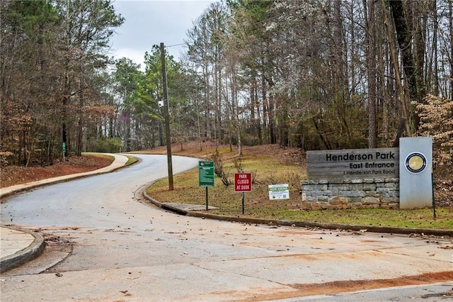 surrounding community featuring aphalt driveway