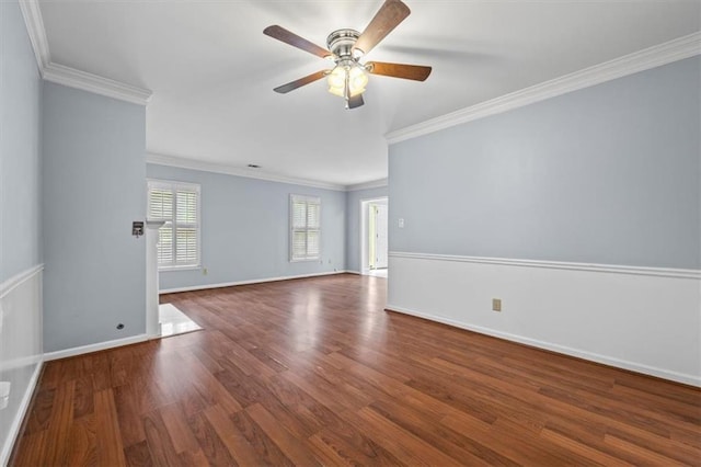 unfurnished room with ornamental molding, ceiling fan, and dark hardwood / wood-style flooring