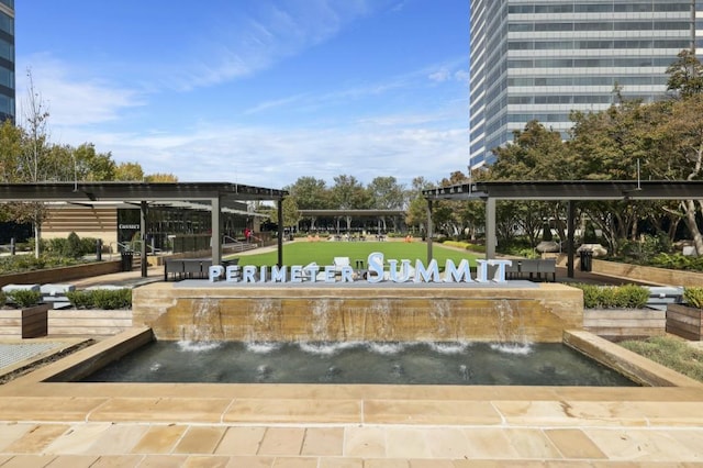 view of community featuring a patio and a pergola