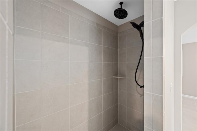 full bathroom with tiled shower