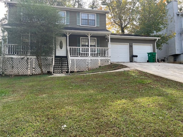 traditional-style house with a front yard, covered porch, driveway, and an attached garage