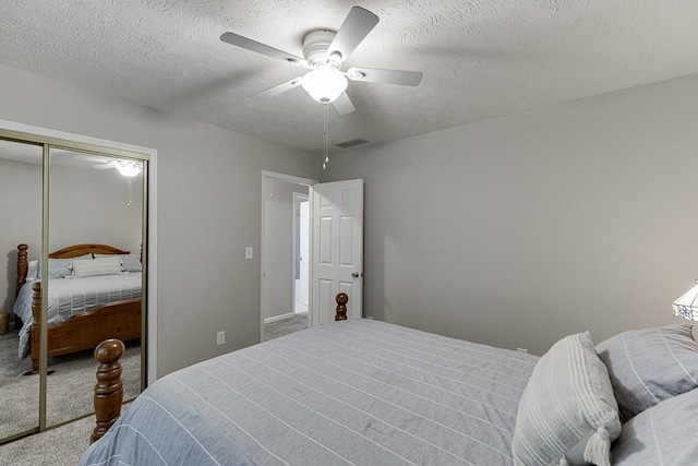 2903 Brookshire Way, Duluth, GA 30096 - carpeted bedroom with a textured ceiling, a closet, and ceiling fan