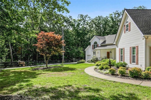 2203 Arbor Hill Rd, Canton, GA 30115 - view of yard with a garage and view of scattered trees