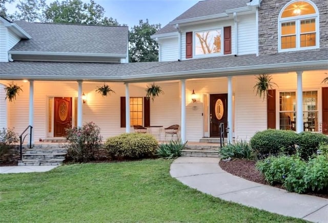 2203 Arbor Hill Rd, Canton, GA 30115 - view of front of home with a porch, a shingled roof, and a front lawn