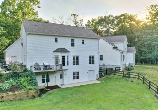 2203 Arbor Hill Rd, Canton, GA 30115 - back of house with a patio, a shingled roof, view of scattered trees, and a deck