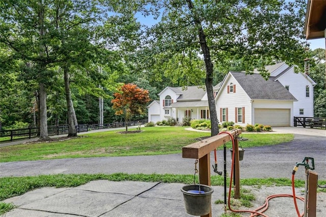 2203 Arbor Hill Rd, Canton, GA 30115 - view of front of house featuring driveway, a garage, and view of scattered trees