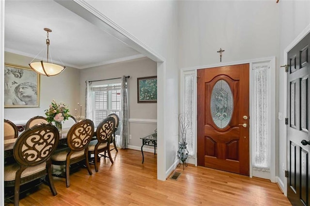 2203 Arbor Hill Rd, Canton, GA 30115 - foyer with light wood finished floors, baseboards, and ornamental molding