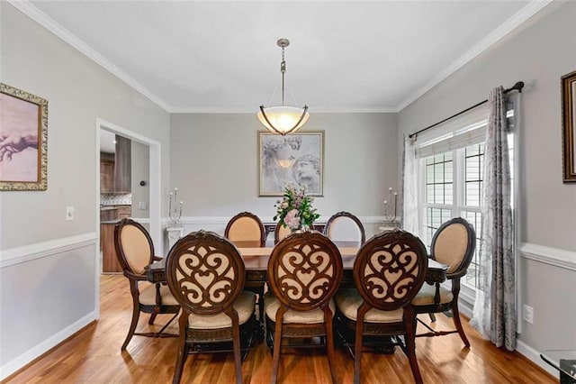 2203 Arbor Hill Rd, Canton, GA 30115 - dining room with light wood-type flooring, ornamental molding, and baseboards