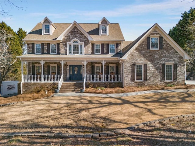 colonial-style house with covered porch