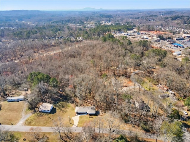 aerial view featuring a forest view