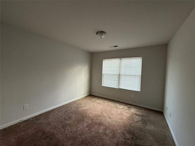 545 Tulip Ln, Mcdonough, GA 30252 - carpeted spare room with baseboards
